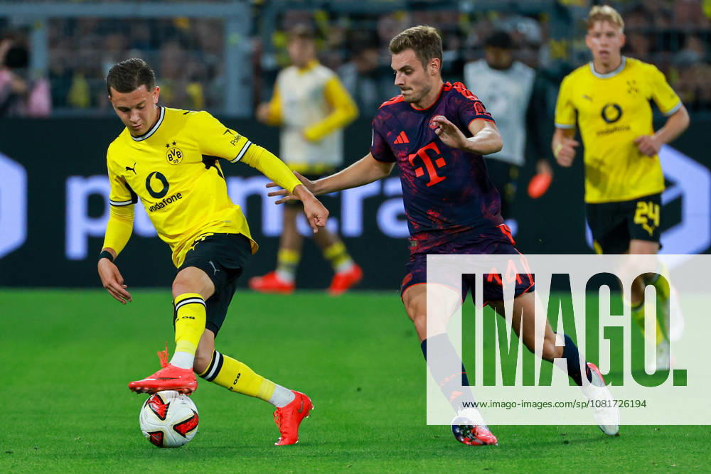 Franz Beckenbauer Supercup 2026 - Borussia Dortmund - FC Bayern München am 22.08.2026 im Signal Iduna Park in Dortmund Konstantinos Karetsas (Dortmund 19) gegen Josip Stanisic (Muenchen 44)
