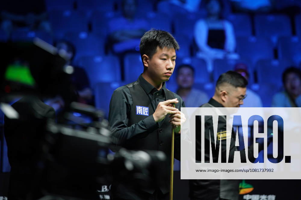 Gao Yang of China chalks the cue in the first round match against Guan Zhen of China on day 1 of Wuhan Open 2026 at the Optics Valley Gymnasium of Huazhong University of Science and Technology on August 23, 2026 in Wuhan, Hubei Province of China.