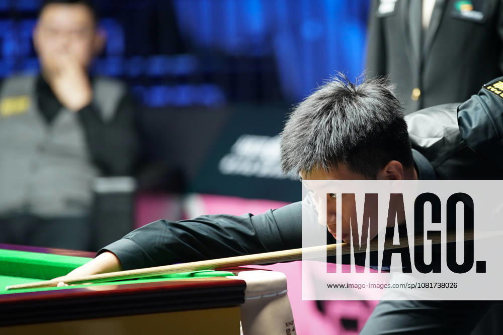 Gao Yang of China plays a shot in the first round match against Guan Zhen of China on day 1 of Wuhan Open 2026 at the Optics Valley Gymnasium of Huazhong University of Science and Technology on August 23, 2026 in Wuhan, Hubei Province of China.