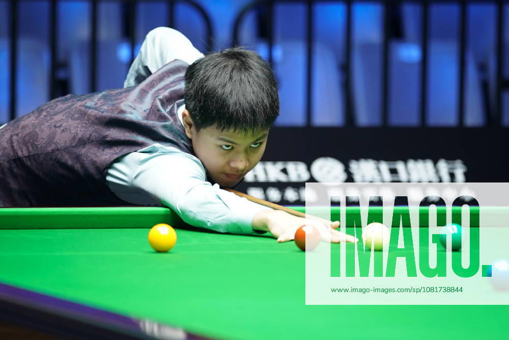 Wang Xinzhong of China plays a shot in the first round match against Ben Mertens of Belgium on day 1 of Wuhan Open 2026 at the Optics Valley Gymnasium of Huazhong University of Science and Technology on August 23, 2026 in Wuhan, Hubei Province of China.