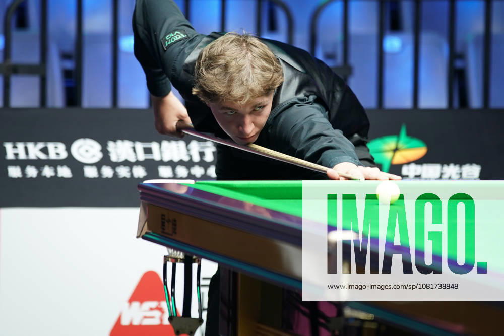 Ben Mertens of Belgium plays a shot in the first round match against Wang Xinzhong of China on day 1 of Wuhan Open 2026 at the Optics Valley Gymnasium of Huazhong University of Science and Technology on August 23, 2026 in Wuhan, Hubei Province of China.