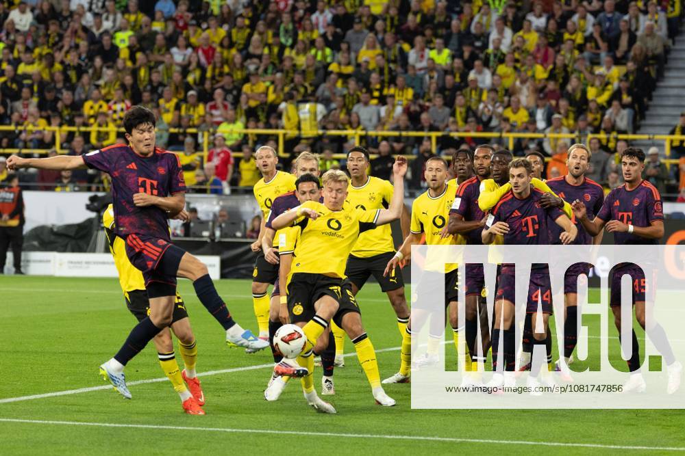 (260823) -- DORTMUND, Aug. 23, 2026 -- Kim Minjae (1st L) of FC Bayern Munich shoots during the Franz Beckenbauer Supercup 2026 football match between FC Bayern Munich and Borussia Dortmund in Dortmund, Germany, Aug. 22, 2026. (Photo by Xinhua) (SP)GERMANY-DORTMUND-FOOTBALL-SUPERCUP-MUNICH VS DORTMUND JoachimxBywaletz