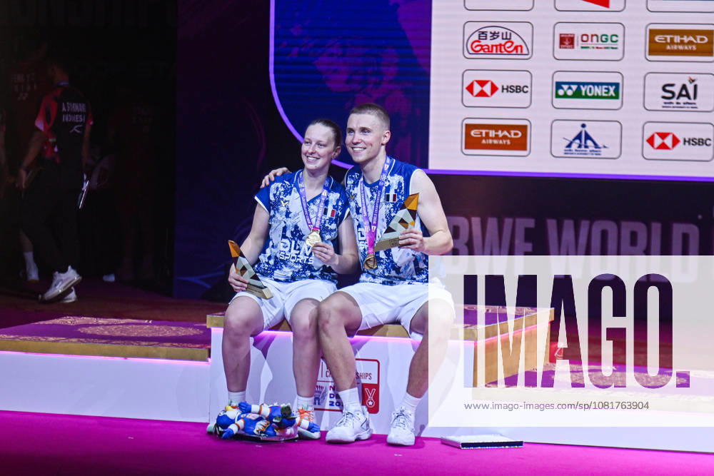 France s Thom Gicquel and Delphine Delrue pose for pictures with their medals after winning the match against China s Feng Yan Zhe and Huang Dong Ping of the Mixed Doubles Finals of the BWF World Championships 2026 in New Delhi, India on August 23, 2026. New Delhi India - ZUMAj168 20260823_zip_j168_008