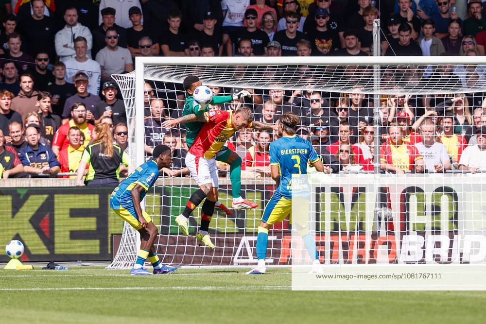 , Stadium De Adelaarshorst , season 2026 2027 , Dutch Eredivisie football . match between Go Ahead Eagles and ADO Den Haag, Picture shows ADO Den Haag goalkeeper Killian Nikiema, Go Ahead Eagles player Victor Edvardsen Go Ahead Eagles - ADO x205969207x