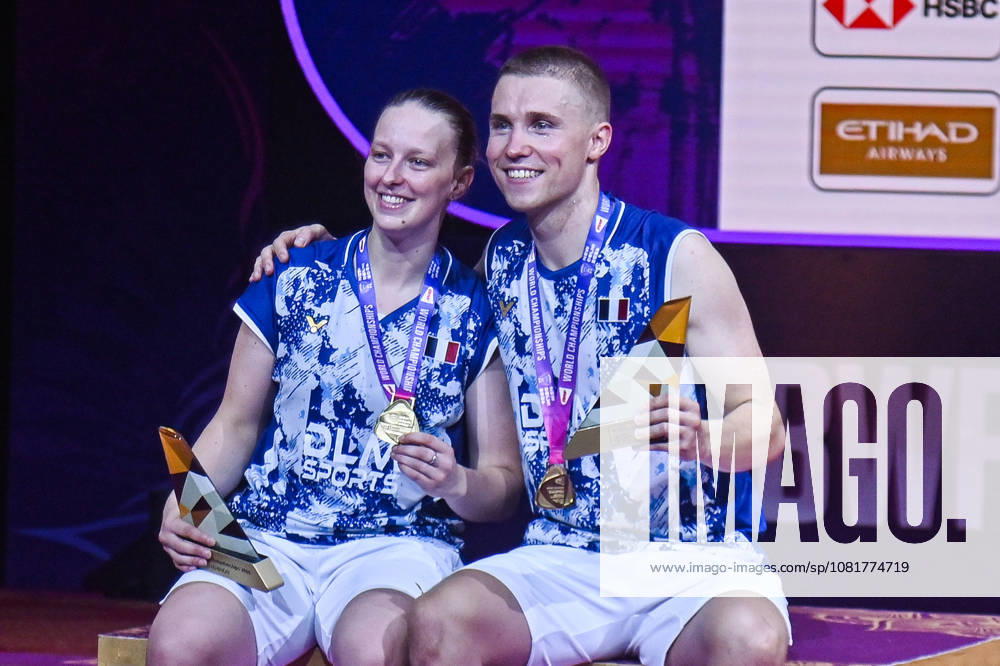 India BWF Championships 2026 France s Thom Gicquel and Delphine Delrue pose for pictures with their medals after winning the match against China s Feng Yan Zhe and Huang Dong Ping in the Mixed Doubles Finals of the BWF World Championships 2026 in New Delhi, India, on August 23, 2026. New Delhi Delhi India