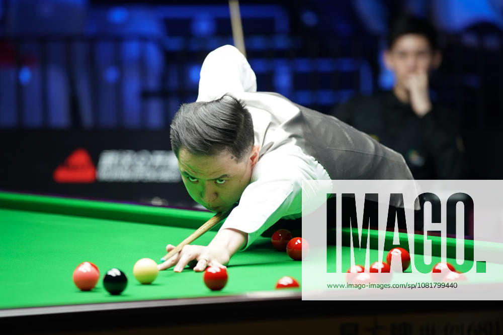 Xiao Guodong of China plays a shot during his 5-0 victory against Wang Xinbo of China in the round of 64 at the 2026 Wuhan Open on August 23, 2026 in Wuhan, Hubei Province of China. The tournament features top snooker players competing for the title.