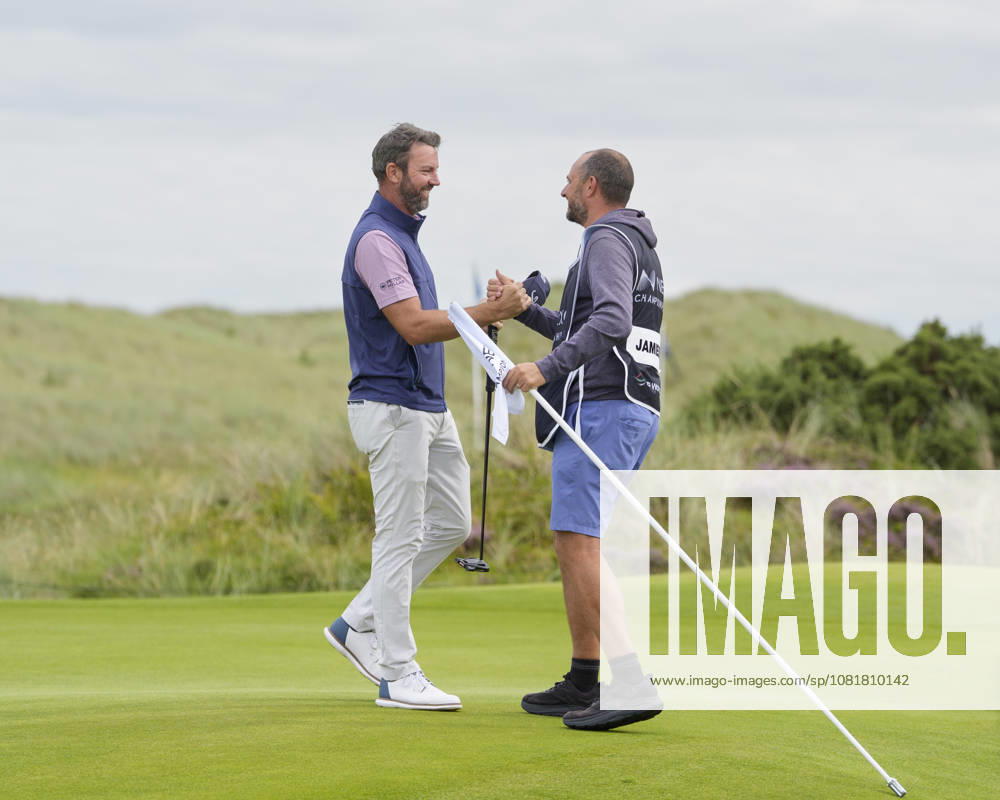 BALMEDIE, SCOTLAND - AUG 23: Scott Jamieson (SCO) celebrates with his caddie after winning the 2026 Nexo Championship at the Trump International Golf Links, Balmedie on August 23, 2026 in Aberdeenshire, Scotland The 2026 Nexo Championship