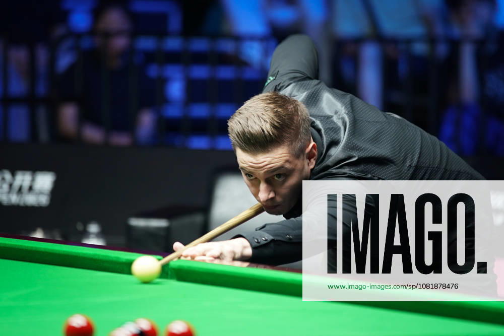 Ashley Carty of England plays a shot in the second round match against Ronnie O Sullivan of England on day 2 of Wuhan Open 2026 at the Optics Valley Gymnasium of Huazhong University of Science and Technology on August 24, 2026 in Wuhan, Hubei Province of China.