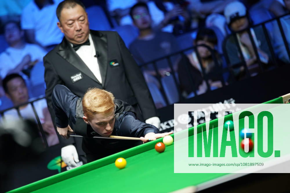 Artemijs Zizins of Latvia plays a shot in the second round match against Wu Yize of China on day 2 of Wuhan Open 2026 at the Optics Valley Gymnasium of Huazhong University of Science and Technology on August 24, 2026 in Wuhan, Hubei Province of China.