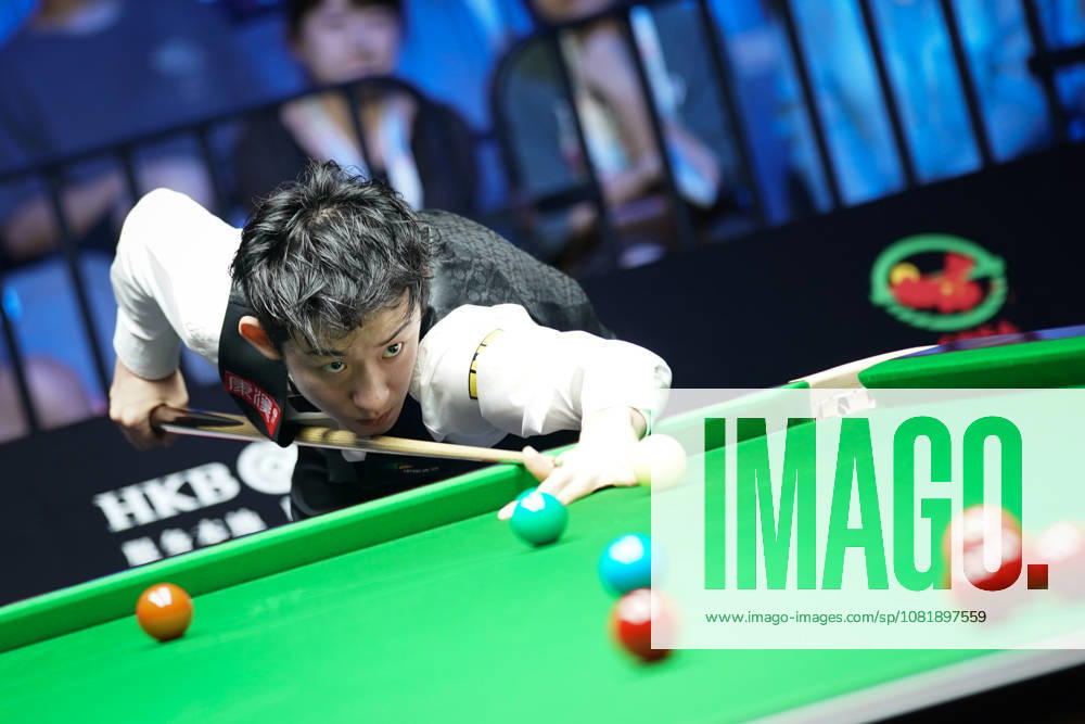 Wu Yize of China plays a shot in the second round match against Artemijs Zizins of Latvia on day 2 of Wuhan Open 2026 at the Optics Valley Gymnasium of Huazhong University of Science and Technology on August 24, 2026 in Wuhan, Hubei Province of China.