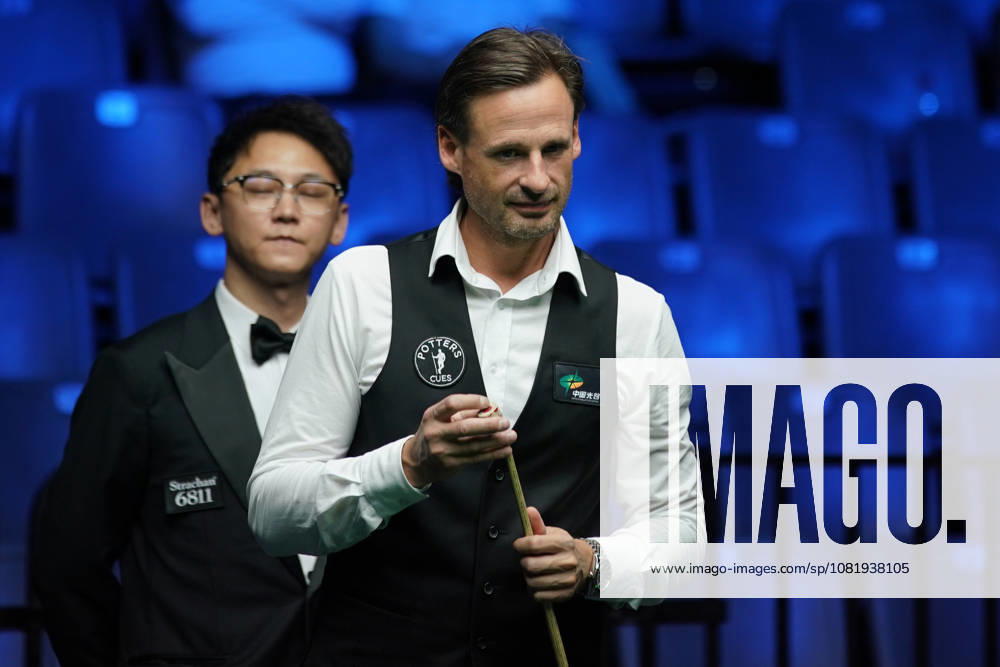 David Gilbert of England plays a shot during his Round of 32 match against Mark Williams of Wales at the 2026 Wuhan Snooker Open on August 24, 2026 in Wuhan, Hubei Province of China. The tournament features top snooker players competing for the championship title.