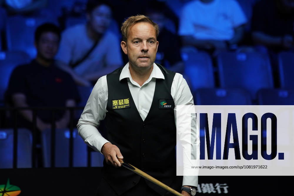 Ali Carter of England plays a shot in the third round match against Kyren Wilson of England on day 3 of Wuhan Open 2026 at the Optics Valley Gymnasium of Huazhong University of Science and Technology on August 25, 2026 in Wuhan, Hubei Province of China.
