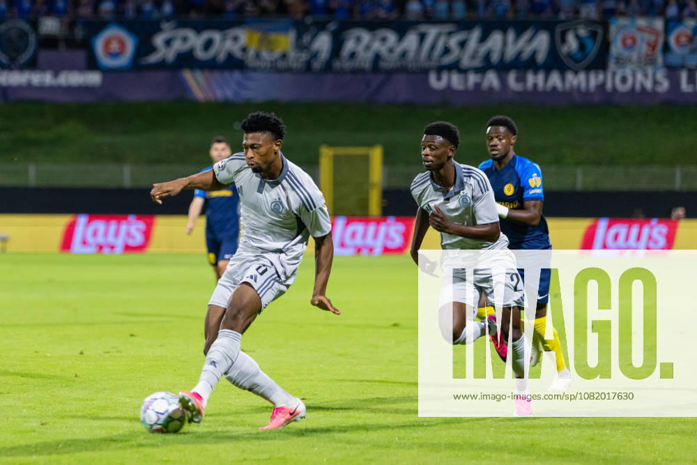 Suleiman Camara of SK Slovan Bratislava and Rahim Ibrahim of SK Slovan Bratislava seen during UEFA Champions league second leg play-off game between teams of SK Slovan Bratislava and Celje (Dominika Kortvelyesiova Ball Raw Images) Celje Stadion Celje Slovenia