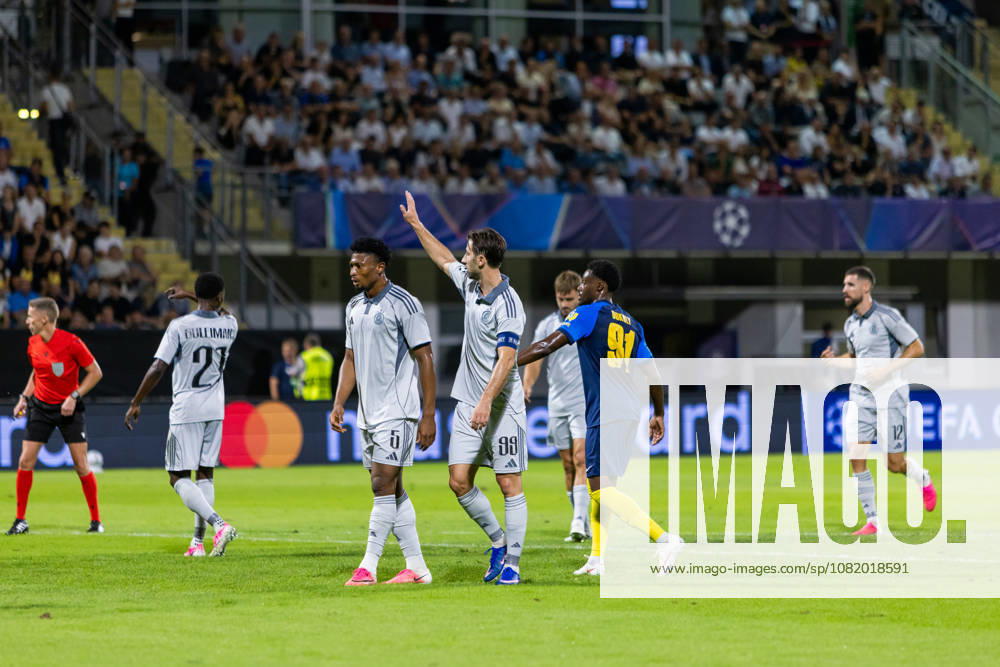Rahim Ibrahim of SK Slovan Bratislava, Andraz Sporar of SK Slovan Bratislava and Yaya Dukuly of Celje seen during UEFA Champions league second leg play-off game between teams of SK Slovan Bratislava and Celje (Dominika Kortvelyesiova Ball Raw Images) Celje Stadion Celje Slovenia