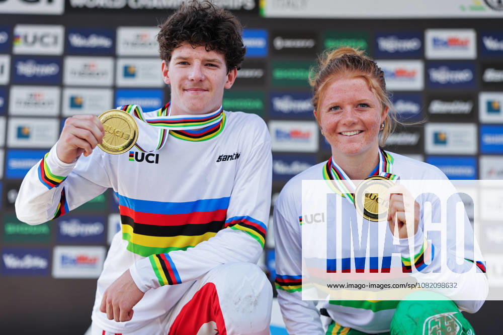 2026 UCI Mountain Bike World Championships Picture by Alex Whitehead SWpix.com - 29 08 2026 - Cycling - 2026 UCI Mountain Bike World Championships - Val di Sole, Trentino, Italy - Downhill (DHI) Final - Men + Women Junior Podium - Raoul Schneeberger (Switzerland) wins the Gold Medal to become World Champion, Tilly Boadle (Australia) wins the Gold Medal to become World Champion