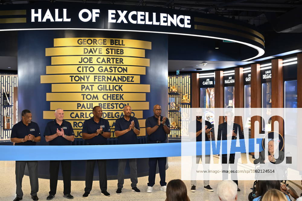Former Toronto Blue Jays players and management, from left, George Bell, Dave Stieb, Joe Carter, Cito Gaston, Carlos Delgado, Jose Bautista, Paul Beeston and Pat Gillick open the team s new Hall of Excellence at Rogers Centre in Toronto on Saturday, Aug. 29, 2026. Canada News - August 29, 2026 - ZUMAc35_ 20260829_zaf_c35_019
