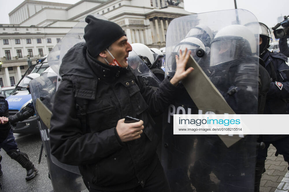 A protester confronts the riot police officer during the demonstration.. We re going for freedom. We re going for everything! (Idziemy po Wolno??. Idziemy po Wszystko!). This was the slogan of a protest in the form of a march organized by the Women s Strike (Strajk Kobiet) against the ruling Law and Justice (PiS) party and the decision of the Constitutional Court that ruled in October to further tighten the country s already restrictive abortion law. The Entrepreneurs Strike organization (Strajk Przedsiebiorcow) and representatives of various other groups and professions joined the protest. Protesters marched from Warsaw s center to Jaroslaw Kaczynski s house - the leader of the Law and Justi - ZUMAs197 20201213_zaa_s197_062