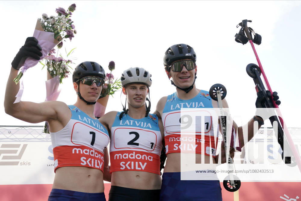 From left, Levi Maury of France, second place, Bruno Bilans of Latvia, first place, and Eliott Maury of France, third place celebrate after their Sprint race of the FIS Rollerski World Championships 2026 in Madona, Latvia, on September 5, 2026. Madona Latvia