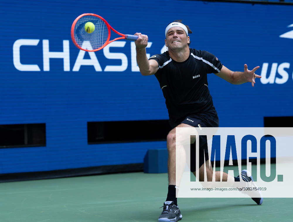 2026 US Open - Day 7 NEW YORK, NEW YORK - SEPTEMBER 5: Taylor Fritz of the United States returns a shot during his match against Francisco Cerundolo of Argentina during the 2026 US Open - Day 7 at USTA Billie Jean King National Tennis Center on September 5, 2026 in New York, New York. New York USTA Billie Jean King National Tennis Center New York United States