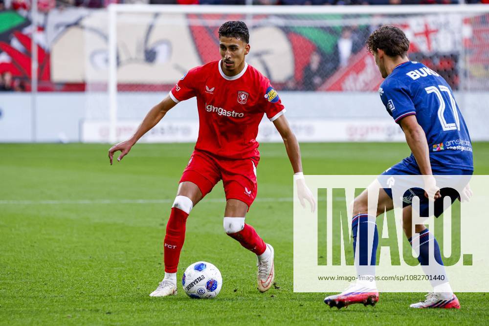 ENSCHEDE - Younes Taha of FC Twente dribbles with the ball under pressure from Patrick Brouwer of Telstar SC during the Eredivisie match between FC Twente and Telstar at De Grolsch Veste stadium on 09 September 2026 in Enschede, the Netherlands. WART BRINKERHOF ANP Eredivisie 2026 27 ANPxSportx xMarcelxterxBalsxIVx 567770314 originalFilename: 567770314