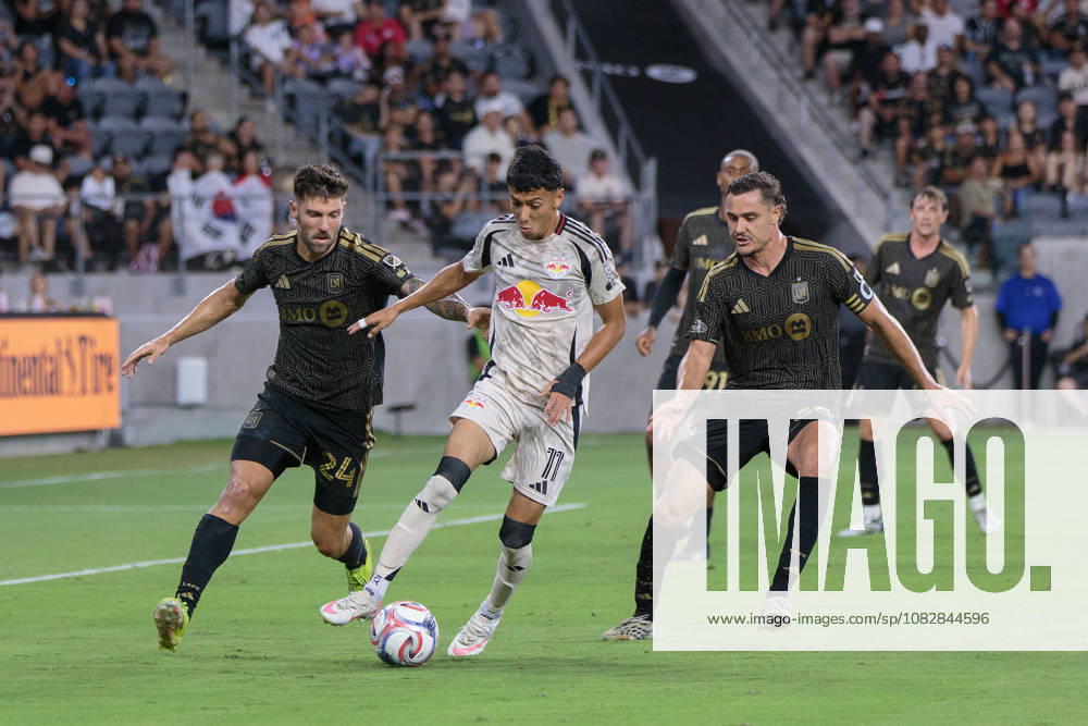 Jorge Ruvalcaba 11 of the New York Red Bulls is challenged by Ryan Hollingshead 24 and Aaron Long 33 of the LAFC during a regular season MLS, Fussball Herren, USA game on Wednesday September 9, 2026 at the BMO Stadium in Los Angeles, California. LAFC defeats Red Bulls, 2-0. DOUGLAS CUELLAR FOTOGRID PI LAFC Defeats Red Bulls, 2-0 - ZUMAp124 20260909_zaa_p124_031