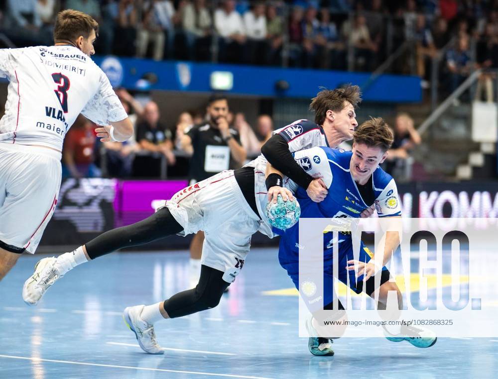 Handball Opel Handball 1. Bundesliga Saison 2026 - 2027 Werner Assmann Halle 4. Spieltag ThSV Eisenach - SG BBM Bietigheim im Foto: Felix Aellen 22 (ThSV Eisenach) im Zweikampf mit Maxim Orlov 24 (SG BBM Bietigheim) ( Deutschland Thueringen Eisenach