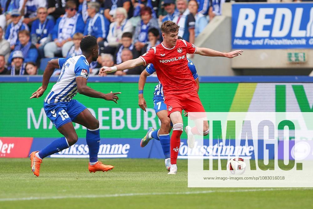 Magdeburg, Sachsen-Anhalt, Deutschland, 12.09.2026: Avnet Arena: 5. Spieltag, Saison 2026 27, 2. Fußball-Bundesliga: 1. FC Magdeburg - 1. FC Kaiserslautern: L-R: Daniel Heber (15, 1. FC Magdeburg), Herbert Bockhorn (7, 1. FC Magdeburg), Alex Murphy (3, 1. FC Kaiserslautern)