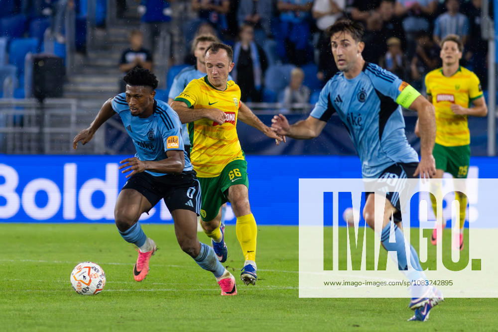 Rahim Ibrahim of SK Slovan Bratislava and Miroslav Kacer of MSK Zilina during Nike Liga 8. Round game between teams SK Slovan Bratislava and MSK Zilina (Dominika Kortvelyesiova Ball Raw Images) Bratislava Tehelne pole stadium Slovakia