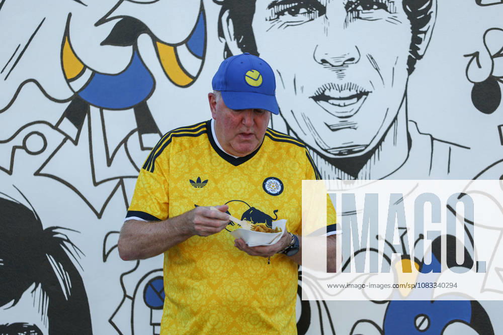 14th September 2026; Elland Road, Leeds, West Yorkshire, England; Premier League Football, Leeds United versus Newcastle United; A fan of Leeds United eating food ahead of the game AidanxHunter