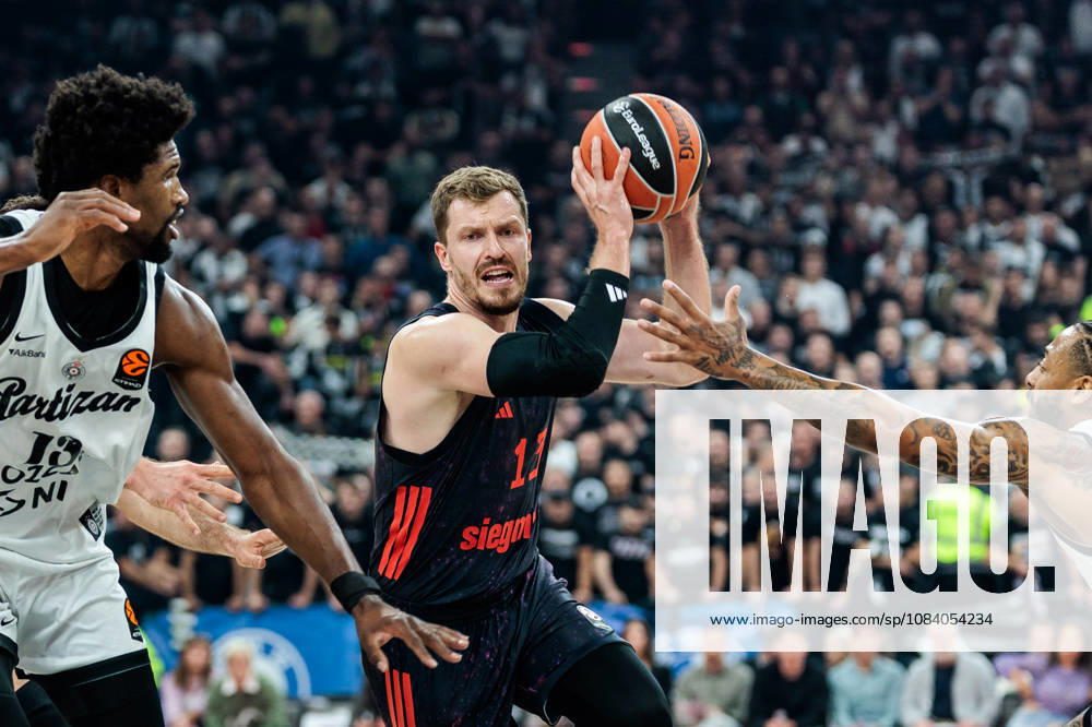 Andreas Andi Obst (FC Bayern Muenchen, 13) controls the ball against Kevarrius Hayes (Partizan Mozzart Bet Belgrade, 13) and Carlik Jones (Partizan Mozzart Bet Belgrade, 1) during the Turkish Airlines EuroLeague match between FC Bayern Muenchen vs. Partizan Mozzart Bet Belgrade at SAP Garden on round 3 of Turkish Airlines EuroLeague on October 02, 2026 in Munich, Germany. Bavaria Germany