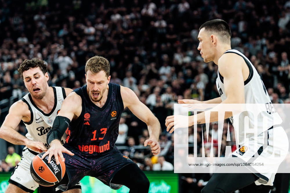 Andreas Andi Obst (FC Bayern Muenchen, 13) controls the ball against Alessandro Pajola (Partizan Mozzart Bet Belgrade, 66) and Nikola Tanaskovic (Partizan Mozzart Bet Belgrade, 10) during the Turkish Airlines EuroLeague match between FC Bayern Muenchen vs. Partizan Mozzart Bet Belgrade at SAP Garden on round 3 of Turkish Airlines EuroLeague on October 02, 2026 in Munich, Germany. Bavaria Germany