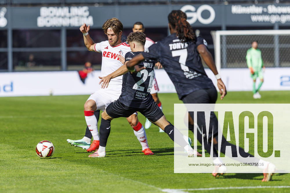 Jan Thielmann (1. FC Köln, 29) and Lucas Wolf (FC Viktoria Köln, 21) during the friendly match between FC Viktoria Köln vs. 1. FC Köln at the Sportpark Hoehenberg on October 3, 2026 in Koeln, Germany. DFL REGULATIONS PROHIBIT ANY USE OF PHOTOGRAPHS AS IMAGE SEQUENCES AND OR QUASI-VIDEO. Nordrhein-Westfalen Germany