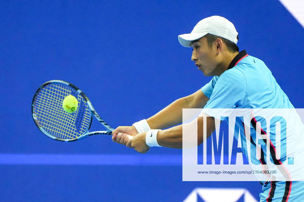 (261003) -- BEIJING, Oct. 3, 2026 -- Shang Juncheng of China hits a return to Alexander Zverev of Germany during the men s singles second round match at 2026 China Open tennis tournament in Beijing, China, Oct. 3, 2026. ) (SP)CHINA-BEIJING-TENNIS-CHINA OPEN-MEN S SINGLES(CN) XiexHan