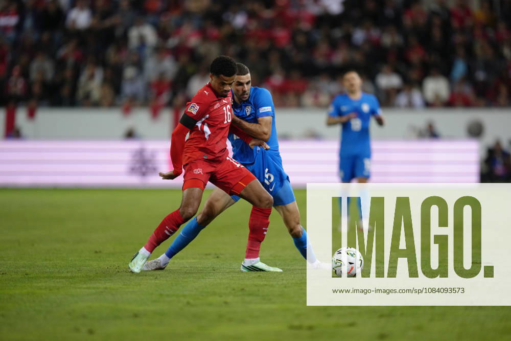 Zachary Athekame (16 SUI) against Danijel Sturm (15 SLO) during the UEFA Nations League match between Switzerland and Slovenia at thermoplan arena on October 03, 2026 in Luzern, Switzerland.