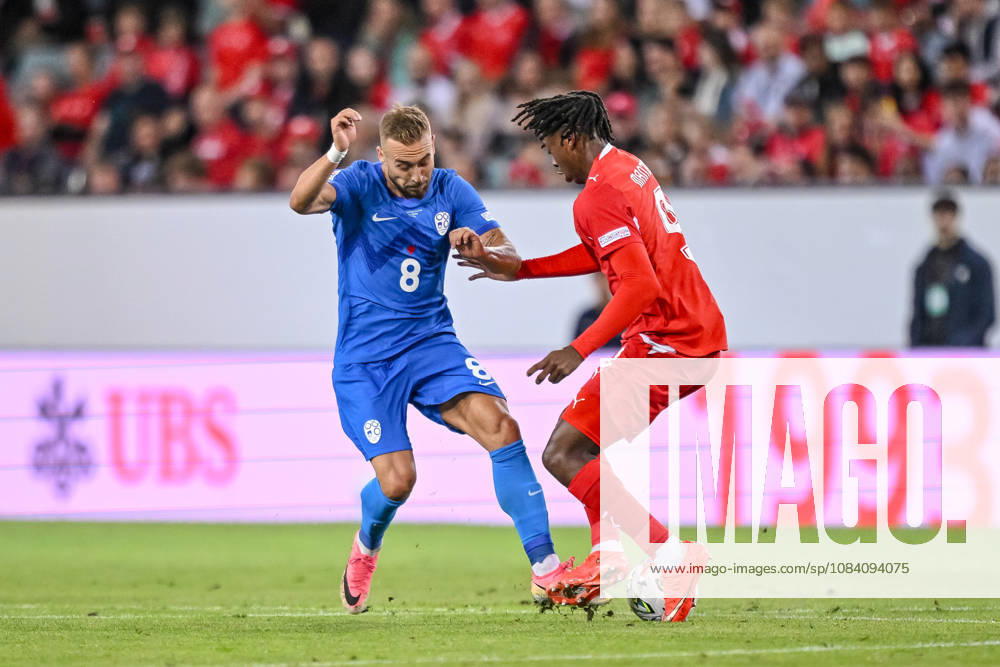Sandi Lovric (Slovenia) and Johan Manzambi (Switzerland) battle for the ball during the UEFA Nations League 2026 27 group phase match between Switzerland and Slovenia at Luzern Arena on October 3, 2026 in Lucerne, Switzerland. (Photo by Harry Langer DeFodi Images) -