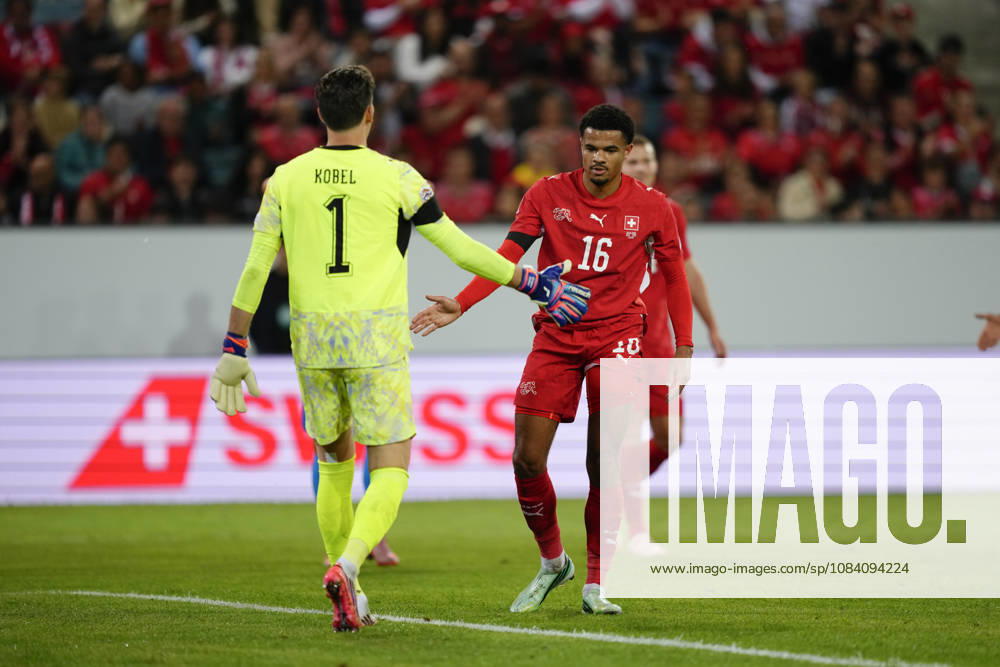 Zachary Athekame (16 SUI) with Goalkeeper Gregor Kobel (1 SUI) after a save during the UEFA Nations League match between Switzerland and Slovenia at thermoplan arena on October 03, 2026 in Luzern, Switzerland.
