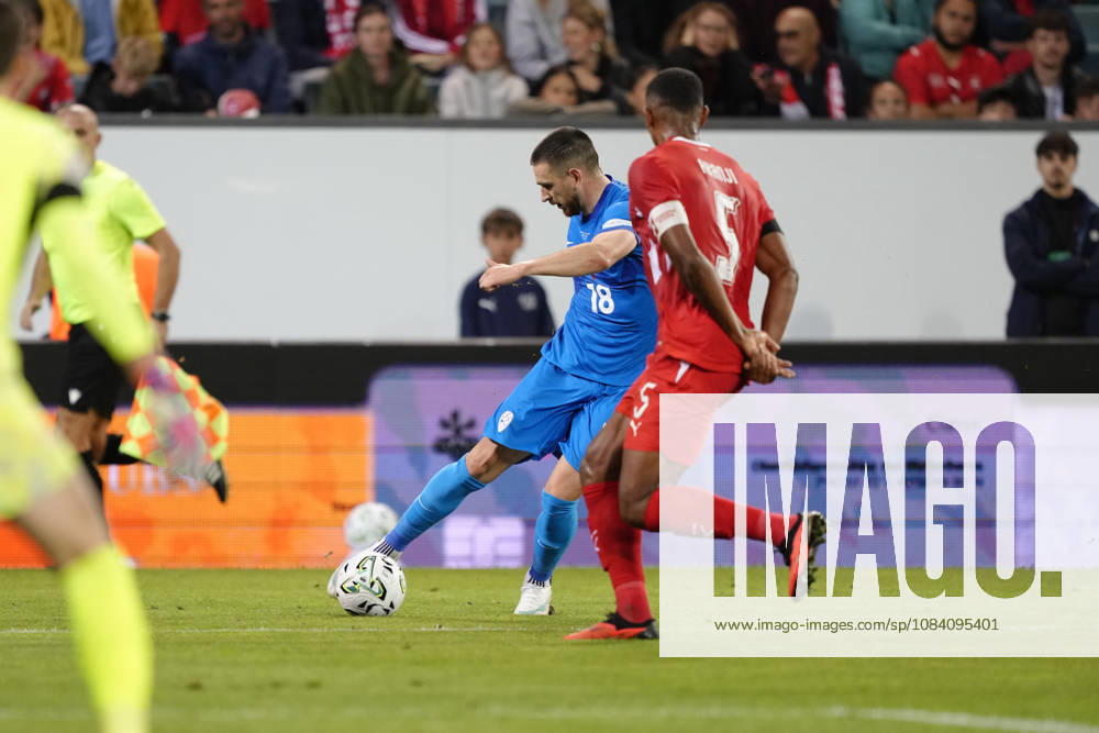 Zan Vipotnik (18 SLO) against Manuel Akanji (5 SUI) during the UEFA Nations League match between Switzerland and Slovenia at thermoplan arena on October 03, 2026 in Luzern, Switzerland.