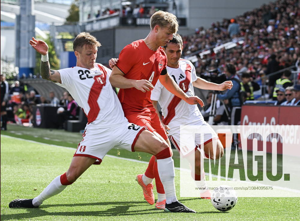 Peru s Oliver Sonne (22) challenges Canada s Luc De Fougerolles (4) during first half International Friendly, Länderspiel, Nationalmannschaft soccer action in Montreal, on Saturday, Oct. 3, 2026. Canada News - October 3, 2026 - ZUMAc35_ 20261003_zaf_c35_032