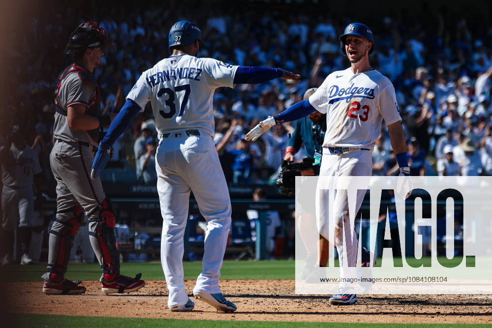 MLB, Baseball Herren, USA National League Division Series - Dodgers vs Braves Game 1 Los Angeles Dodgers outfielder Kyle Tucker (R) celebrates with outfielder Teoscar Hernandez (L) after hitting a two-run home run during the sixth inning in Game 1 of the National League Division Series between the Atlanta Braves and the Los Angeles Dodgers at UNIQLO Field at Dodger Stadium in Los Angeles, California, USA, 03 October 2026. LOS ANGELES CALIFORNIA UNITED STATES