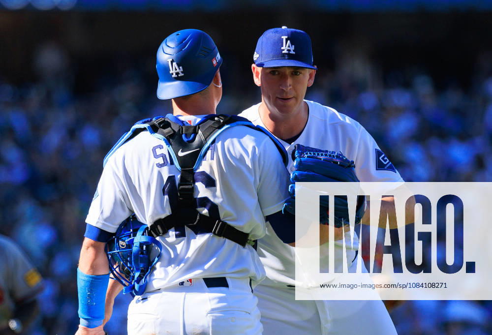 Closer Evan Phillips 59 of the Los Angeles Dodgers is congratulated by Will Smith 16 during a NLDS Game 1 against the Atlanta Braves on Saturday October 3, 2026 at Dodger Stadium in Los Angeles, California. JAVIER ROJAS PI Los Angeles USA - ZUMAp124 20261003_zaa_p124_021