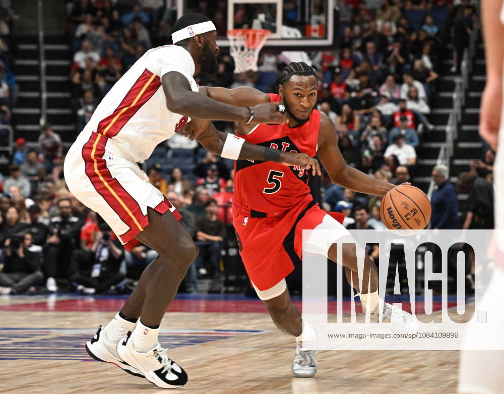 Toronto Raptors Immanuel Quickley drives past Miami Heat s Bobby Portis Jr. during NBA, Basketball Herren, USA preseason basketball action in Quebec City, Saturday, Oct. 3, 2026. Canada News - October 3, 2026 - ZUMAc35_ 20261003_zaf_c35_120