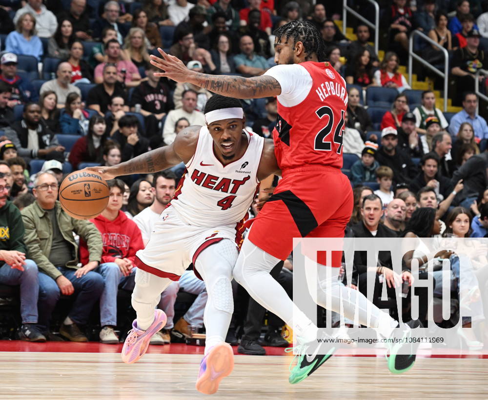 Miami Heat s Ryan Conwell, left, drives at Toronto Raptors Chucky Hepburn during NBA, Basketball Herren, USA preseason basketball action in Quebec City, Saturday, Oct. 3, 2026. Canada News - October 3, 2026 - ZUMAc35_ 20261003_zaf_c35_131