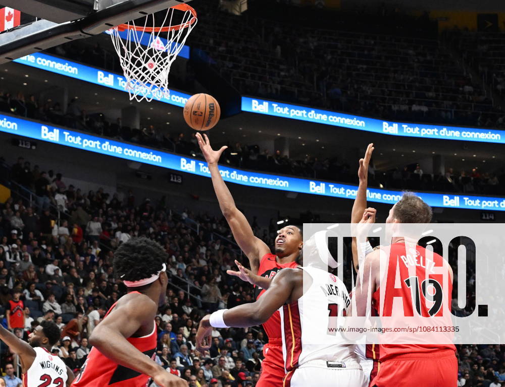 Toronto Raptors Scottie Barnes shoots as Miami Heat s Bam Adebayo looks on during NBA, Basketball Herren, USA preseason basketball action in Quebec City, Saturday, Oct. 3, 2026. Canada News - October 3, 2026 - ZUMAc35_ 20261003_zaf_c35_127
