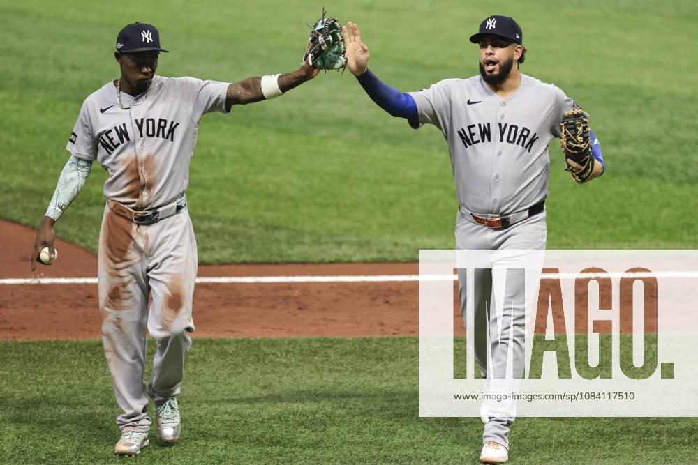 New York Yankees infielders Jazz Chisholm Jr. (13) and Luis GarcoÂa Jr. (26) run to the dugout in the top of the third inning of game one of the ALDS for the 2026 MLB, Baseball Herren, USA Playoffs against the Tampa Bay Rays on October 3, 2026 at Tropicana Field. The Rays beat the Yankees 1-0. St. Petersburg USA - ZUMAh180 20261003_zsp_h180_057