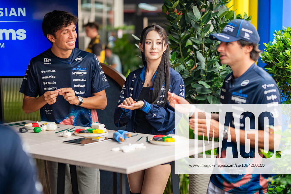 2026 Formula 1 Singapore - Tzuyu at Media Day TZUYU (TPE) K-Pop Singer and Member of TWICE with ALEXANDER ALBON 23 (THA) of Atlassian Williams F1 Team (Williams FW48) and CARLOS SAINZ 55 (ESP) of Atlassian Williams F1 Team (Williams FW48) in the Williams hospitality on Thursday Media Day during the Formula 1 Singapore Airlines Singapore Grand Prix 2026 at Marina Bay Street Circuit, Singapore, on October 8, 2026. Photo by Antoine LAPEYRE Reveries Agency via ABACAPRESS.COM Singapore Singapore