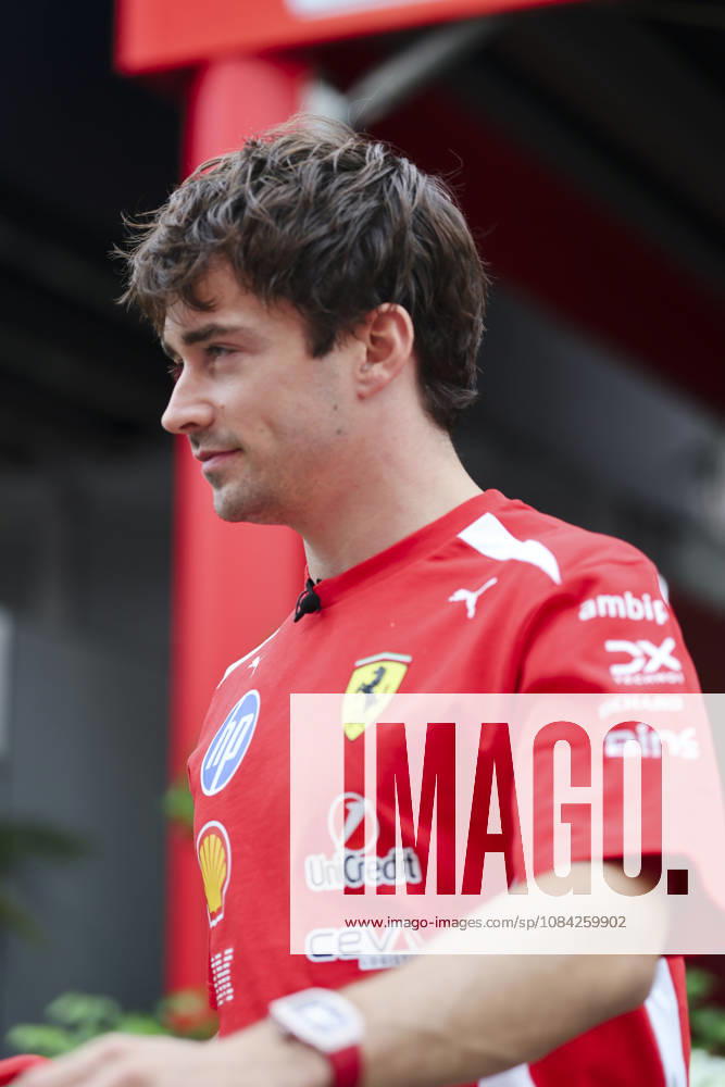 CHARLES LECLERC of Scuderia Ferrari walks towards the team garage in the paddock ahead of the 2026 Formula 1 Singapore Grand Prix at Marina Bay Street Circuit in Singapore. Singapore Singapore - ZUMAh201 20261008_zsp_h201_003