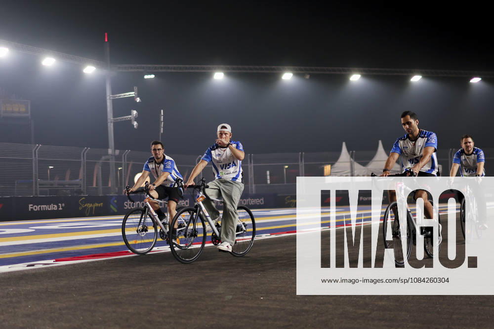 Members of LIAM LAWSON s Visa Cash App Racing Bulls team ride bicycles around Marina Bay Street Circuit to inspect the track conditions ahead of the 2026 Formula 1 Singapore Grand Prix in Singapore. Singapore Singapore - ZUMAh201 20261008_zsp_h201_037