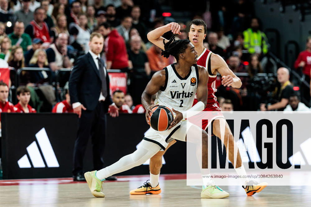 Marcus Carr (Virtus Bologna, 2) controls the ball against Vladimir Lucic (FC Bayern Muenchen, 11) during the Turkish Airlines EuroLeague match between FC Bayern Muenchen vs. Virtus Bologna at SAP Garden on round 4 of Turkish Airlines EuroLeague on October 08, 2026 in Munich, Germany. Bavaria Germany