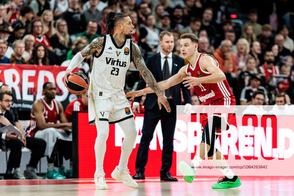 Daniel Hackett (Virtus Bologna, 23) controls the ball against Rokas Jokubaitis (FC Bayern Muenchen, 31) during the Turkish Airlines EuroLeague match between FC Bayern Muenchen vs. Virtus Bologna at SAP Garden on round 4 of Turkish Airlines EuroLeague on October 08, 2026 in Munich, Germany. Bavaria Germany