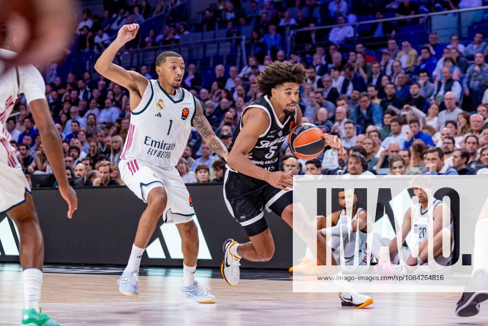 ESP: Euroleague Real Madrid v Partizan Belgrade Nick Smith Jr of Real Madrid and Ethan Thompson of Partizan during the Euroleague match between Real Madrid and Partizan Mozzart Bet Belgrade played at Movistar Arena Stadium on October 8 2026 in Madrid Spain Madrid Spain Basketball